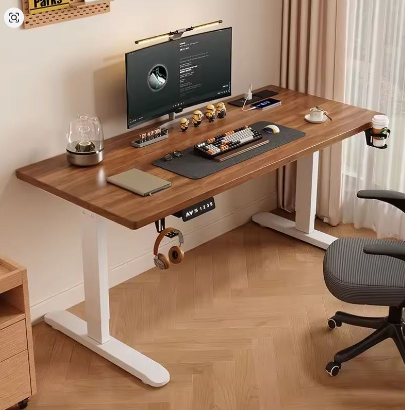 تخلص من آلام الظهر والخمول أثناء العمل بلمسة زر – مكتب الوقوف الكهربائي هو استثمارك الصحي والمهني الأمثل